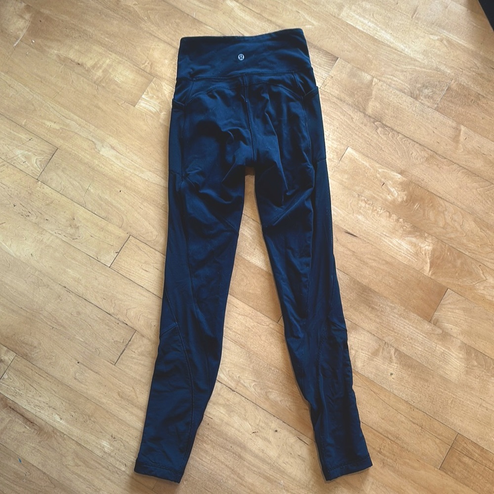 Lululemon running leggings with pockets and mesh paneling